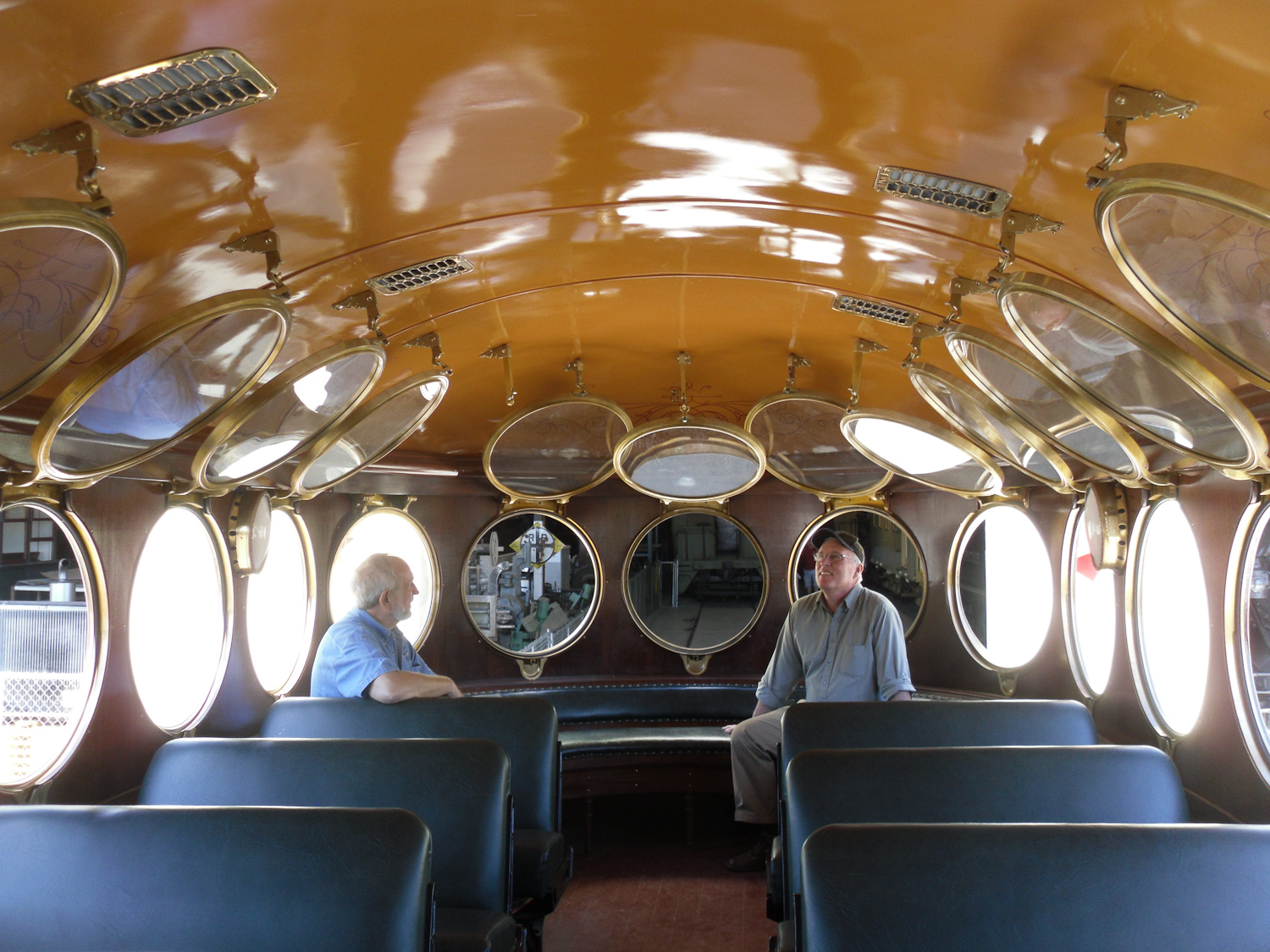 Inside the McKeen motor car with Bob and our docent.
